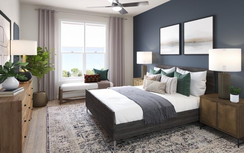 a bedroom with a bed and a couch